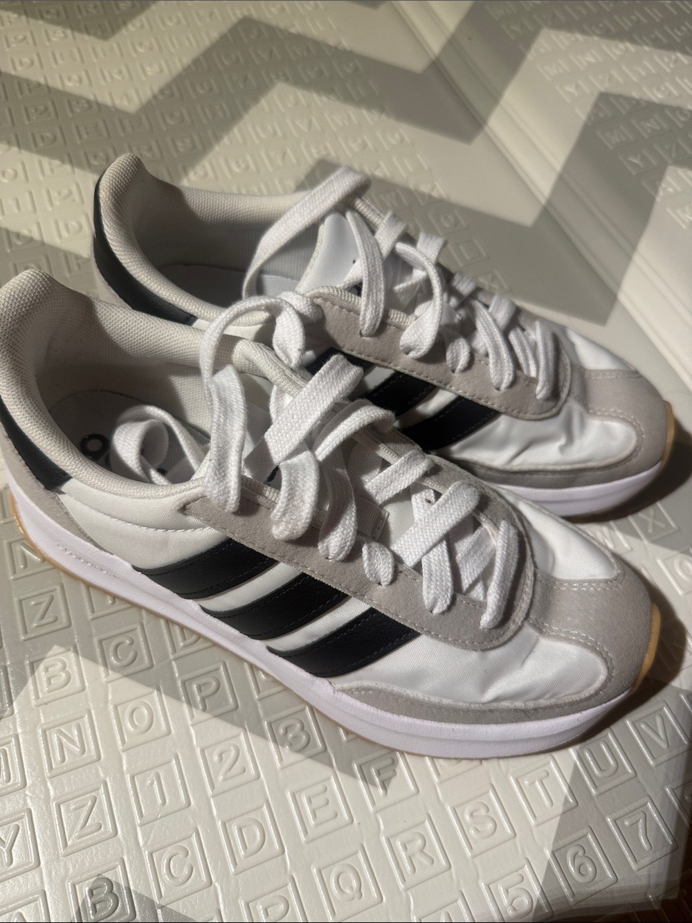 adidas Women’s White Sneakers with Black Three Stripes